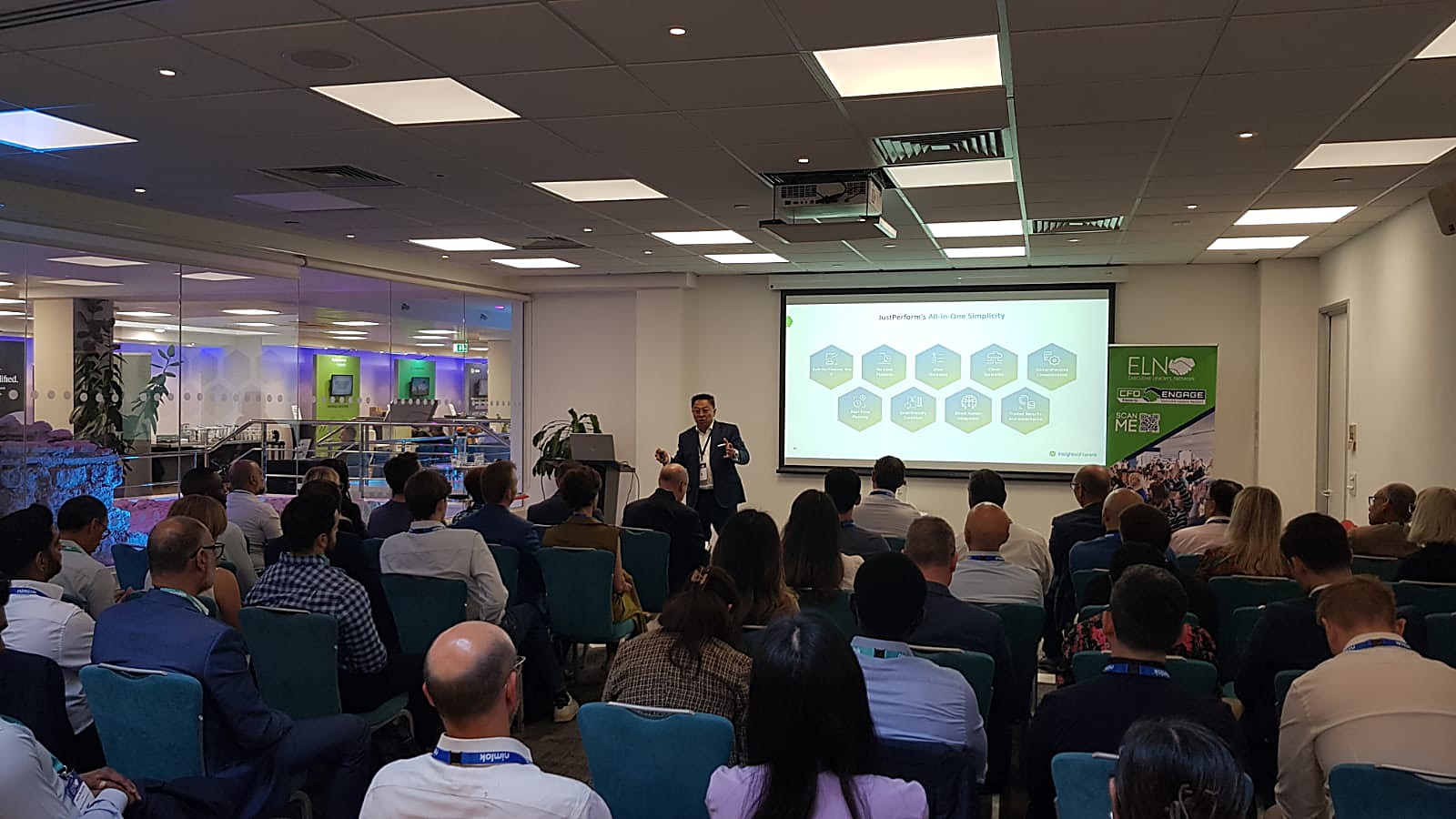 A speaker presenting to the room at an ELN event