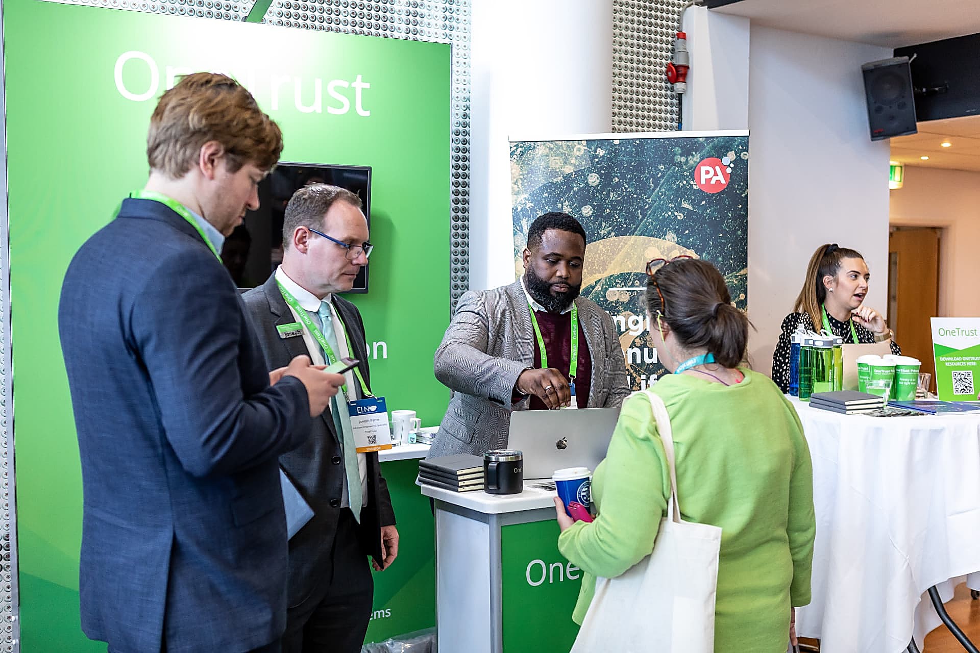 Delegates visiting sponsor stands during a break